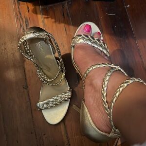 Pre-used but looks like new as in the photos. High heels but very comfy.